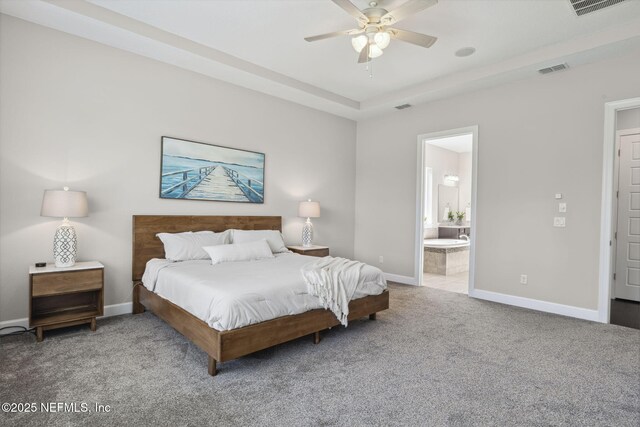 168 Bronson Pkwy, Saint Augustine, FL 32095 - carpeted bedroom featuring ensuite bath and ceiling fan