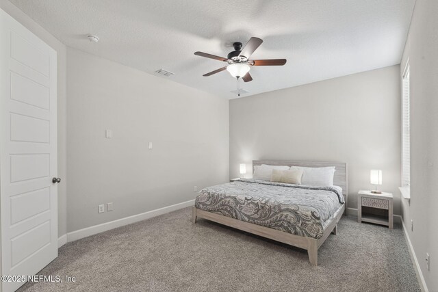 168 Bronson Pkwy, Saint Augustine, FL 32095 - bedroom with carpet, ceiling fan, and a textured ceiling