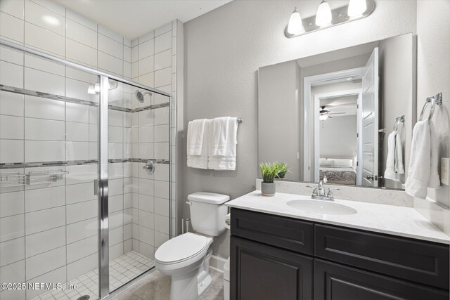 168 Bronson Pkwy, Saint Augustine, FL 32095 - ensuite bathroom featuring vanity, a ceiling fan, and a stall shower