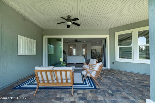 168 Bronson Pkwy, Saint Augustine, FL 32095 - view of patio featuring an outdoor living space and a ceiling fan