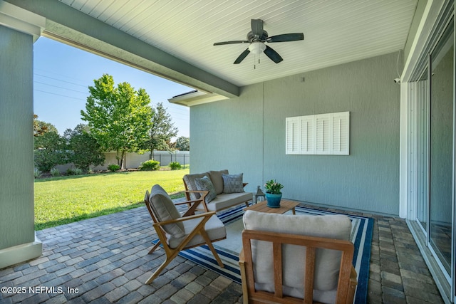 168 Bronson Pkwy, Saint Augustine, FL 32095 - fenced backyard with a patio area, an outdoor hangout area, and a ceiling fan