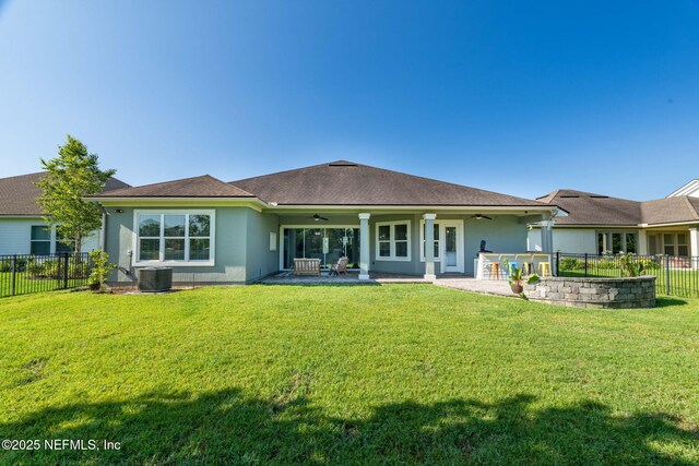 168 Bronson Pkwy, Saint Augustine, FL 32095 - rear view of property featuring a ceiling fan, a fenced backyard, and a patio
