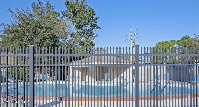 3801 Crown Point Rd Unit 1332, Jacksonville, FL 32257 - gate with a community pool