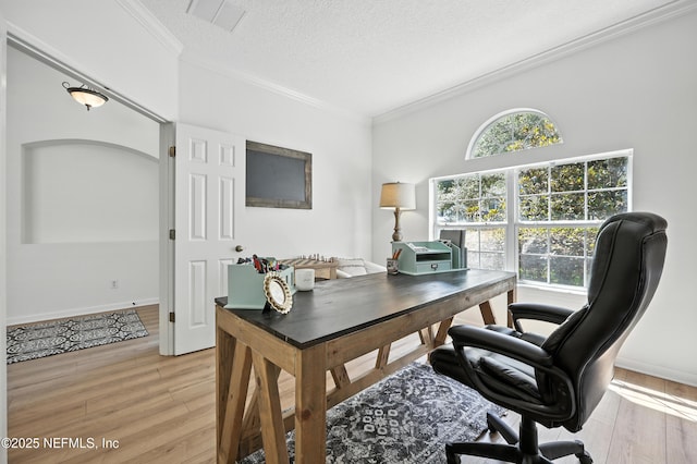 6105 Caladesi Ct, Jacksonville, FL 32258 - home office featuring ornamental molding, light wood finished floors, and a textured ceiling