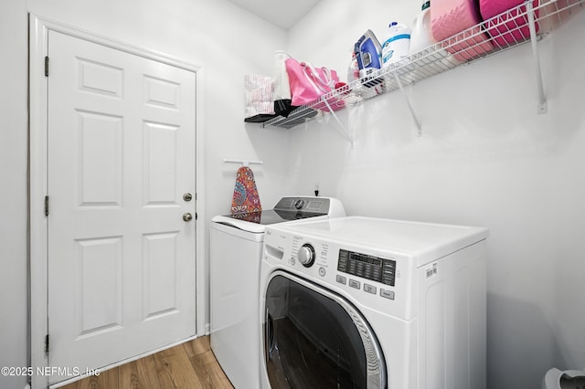 6105 Caladesi Ct, Jacksonville, FL 32258 - laundry area with washing machine and dryer and light wood finished floors