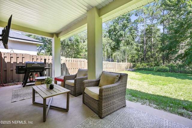 6105 Caladesi Ct, Jacksonville, FL 32258 - fenced backyard with a patio area, view of wooded area, and grilling area
