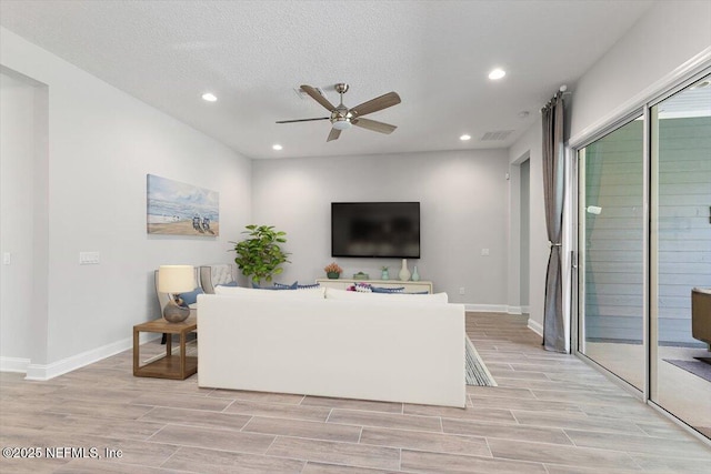 150 Calumet Dr, Saint Johns, FL 32259 - living area with ceiling fan, light wood-style floors, recessed lighting, and a textured ceiling