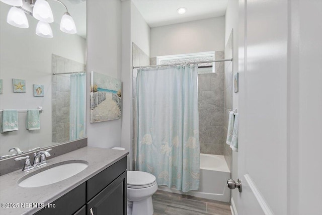 150 Calumet Dr, Saint Johns, FL 32259 - full bath featuring wood finished floors, vanity, shower / bath combo with shower curtain, and a chandelier