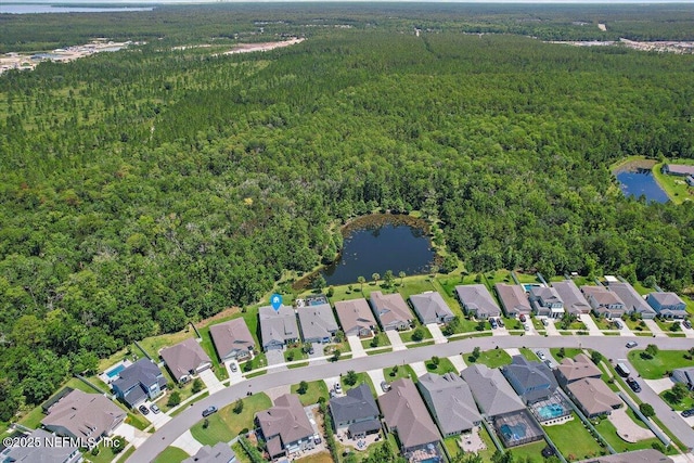150 Calumet Dr, Saint Johns, FL 32259 - aerial view of property and surrounding area featuring a heavily wooded area and nearby suburban area
