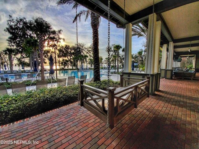 150 Calumet Dr, Saint Johns, FL 32259 - deck at dusk featuring a community pool