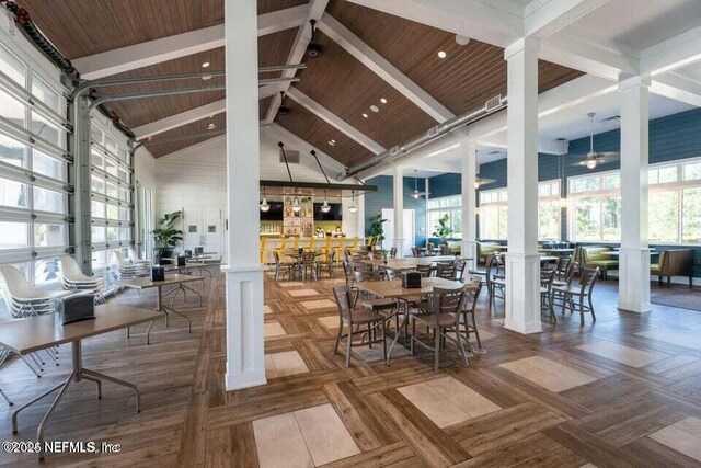 150 Calumet Dr, Saint Johns, FL 32259 - dining space featuring decorative columns, high vaulted ceiling, and beam ceiling
