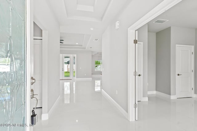 20 Evansville Ln, Palm Coast, FL 32164 - tiled foyer entrance featuring a raised ceiling and baseboards