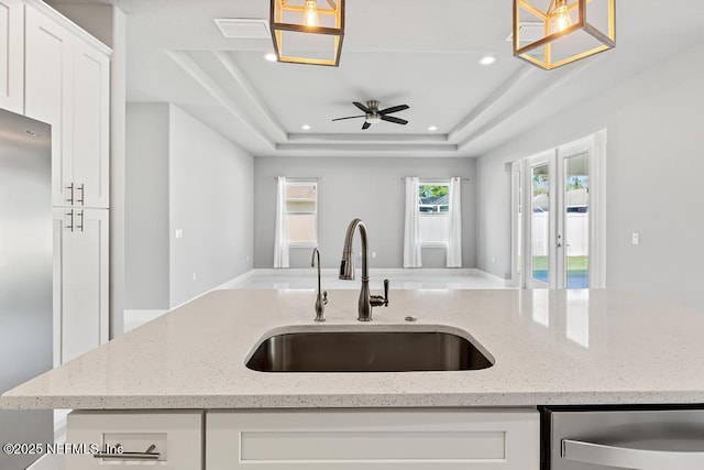 20 Evansville Ln, Palm Coast, FL 32164 - kitchen with open floor plan, recessed lighting, stainless steel appliances, a ceiling fan, and healthy amount of natural light
