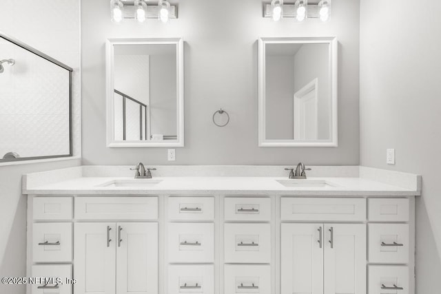 20 Evansville Ln, Palm Coast, FL 32164 - bathroom featuring double vanity and a tile shower