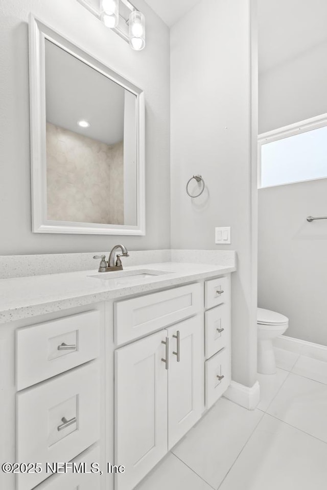 20 Evansville Ln, Palm Coast, FL 32164 - bathroom featuring vanity and tile patterned floors