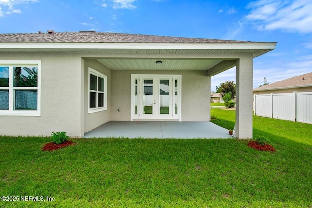 20 Evansville Ln, Palm Coast, FL 32164 - back of property featuring stucco siding, french doors, a patio, and roof with shingles