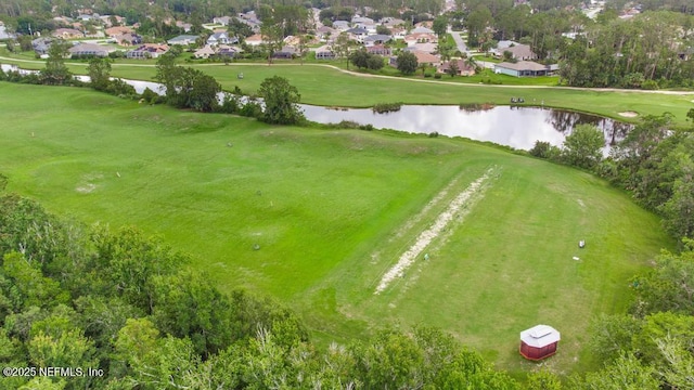 20 Evansville Ln, Palm Coast, FL 32164 - aerial perspective of suburban area with a nearby body of water and a golf course