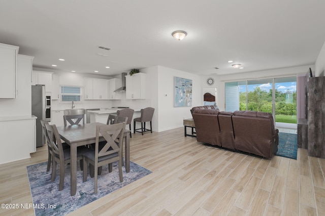 174 Torres Trce, Saint Augustine, FL 32095 - dining area with light wood finished floors and recessed lighting