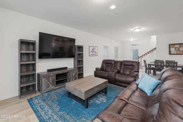174 Torres Trce, Saint Augustine, FL 32095 - living room with stairway and light wood-style flooring