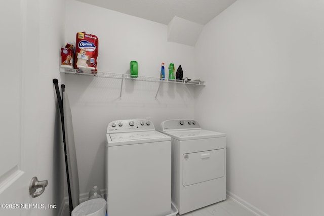 174 Torres Trce, Saint Augustine, FL 32095 - laundry area with washer and dryer and light marble finish floors