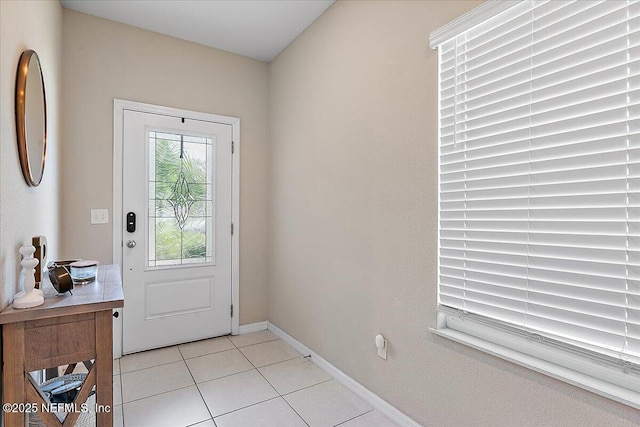 235 Brybar Dr, Saint Augustine, FL 32095 - entryway with light tile patterned floors and baseboards