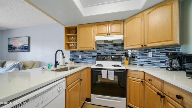4250 A1A Unit B16, Saint Augustine, FL 32080 - kitchen with electric range oven, under cabinet range hood, dishwasher, and decorative backsplash