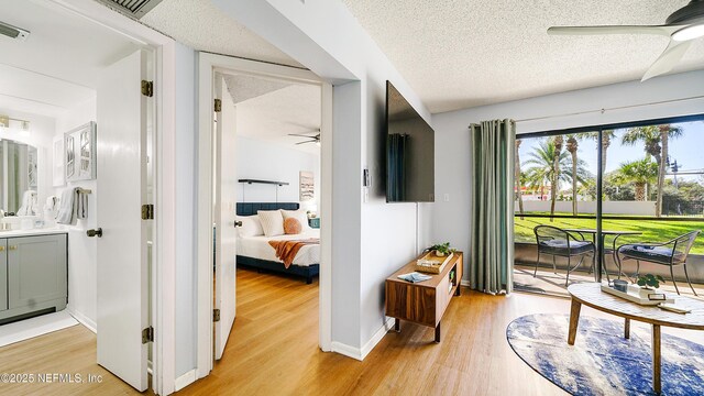4250 A1A Unit B16, Saint Augustine, FL 32080 - hall with light wood-style floors and a textured ceiling