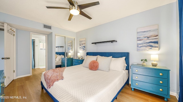4250 A1A Unit B16, Saint Augustine, FL 32080 - bedroom featuring a closet, wood finished floors, and a ceiling fan