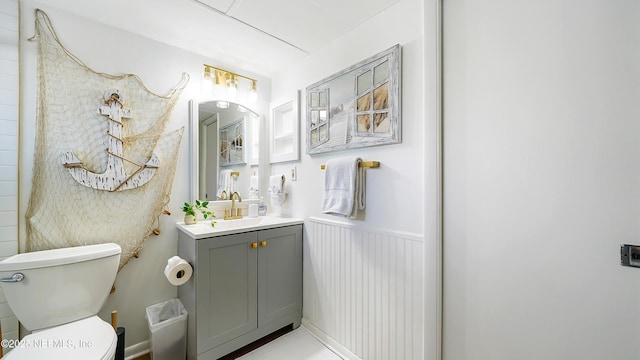 4250 A1A Unit B16, Saint Augustine, FL 32080 - bathroom featuring vanity and a wainscoted wall