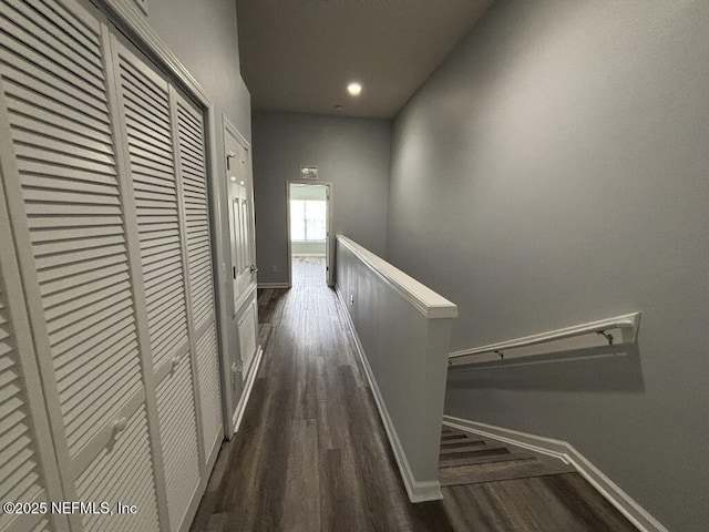 6967 Roundleaf Dr, Jacksonville, FL 32258 - corridor featuring dark wood-type flooring, recessed lighting, and an upstairs landing