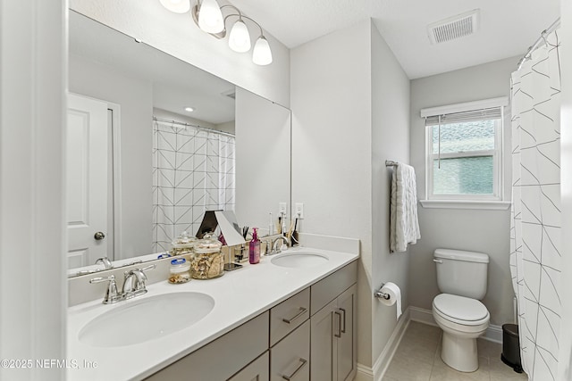105 Meadow Creek Dr, Saint Johns, FL 32259 - bathroom featuring double vanity, tile patterned floors, and curtained shower
