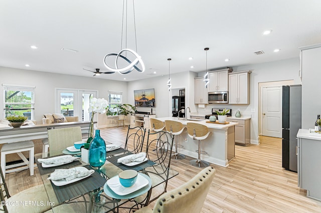105 Meadow Creek Dr, Saint Johns, FL 32259 - dining area with light wood finished floors, recessed lighting, and a ceiling fan