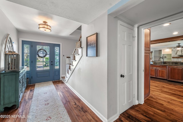 3679 Rustic Ln, Jacksonville, FL 32217 - foyer entrance featuring dark wood-style floors, stairway, recessed lighting, and a ceiling fan