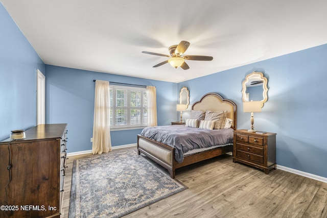 3679 Rustic Ln, Jacksonville, FL 32217 - bedroom featuring wood finished floors and ceiling fan