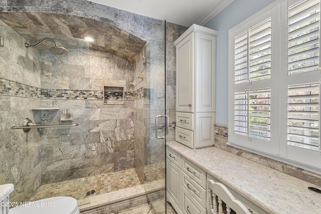 3679 Rustic Ln, Jacksonville, FL 32217 - bathroom featuring a stall shower and ornamental molding