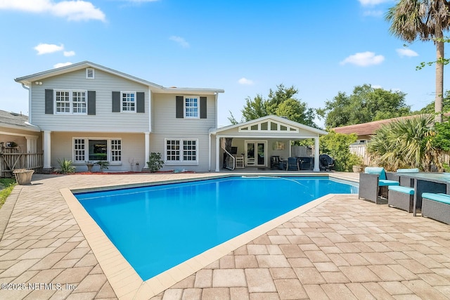 3679 Rustic Ln, Jacksonville, FL 32217 - view of swimming pool with a patio area