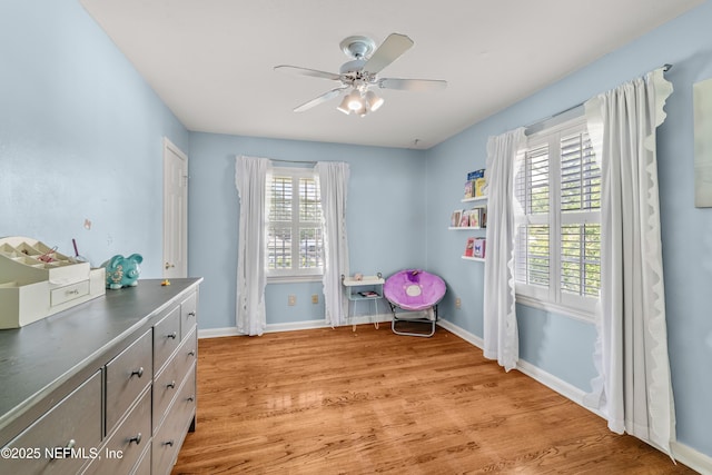 3679 Rustic Ln, Jacksonville, FL 32217 - sitting room featuring light wood-style flooring and a ceiling fan