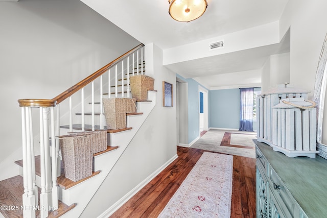 3679 Rustic Ln, Jacksonville, FL 32217 - foyer entrance featuring wood finished floors and stairway
