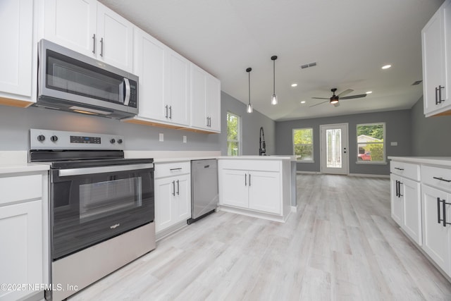 460 S Nassau St, Saint Augustine, FL 32084 - kitchen with appliances with stainless steel finishes, recessed lighting, ceiling fan, light countertops, and plenty of natural light
