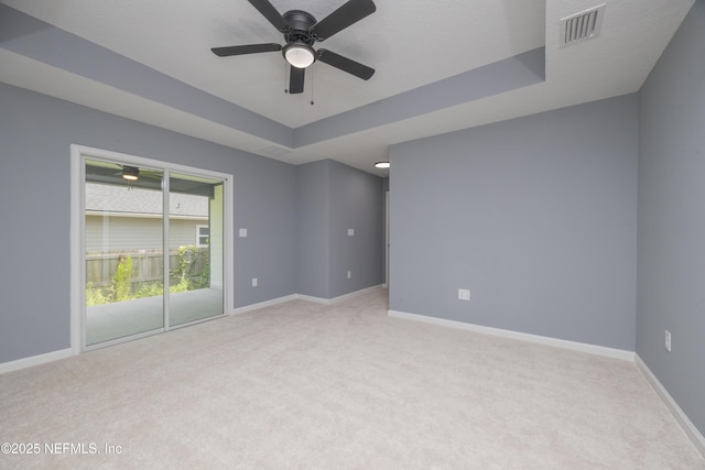 460 S Nassau St, Saint Augustine, FL 32084 - carpeted spare room with ceiling fan and a raised ceiling