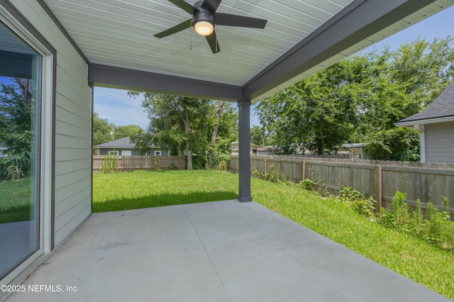 460 S Nassau St, Saint Augustine, FL 32084 - fenced backyard with ceiling fan and a patio