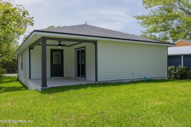 460 S Nassau St, Saint Augustine, FL 32084 - back of house with a yard, ceiling fan, a patio area, and roof with shingles