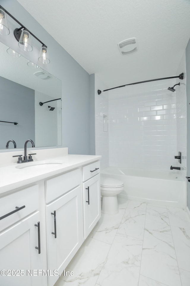 460 S Nassau St, Saint Augustine, FL 32084 - bathroom featuring vanity, shower / tub combination, and marble look tiles