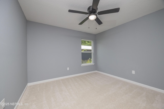 460 S Nassau St, Saint Augustine, FL 32084 - carpeted spare room with baseboards and ceiling fan