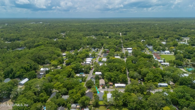 460 S Nassau St, Saint Augustine, FL 32084 - aerial view of property and surrounding area featuring a heavily wooded area
