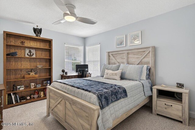 611 Selva Lakes Cir, Atlantic Beach, FL 32233 - bedroom featuring carpet floors, a textured ceiling, and ceiling fan