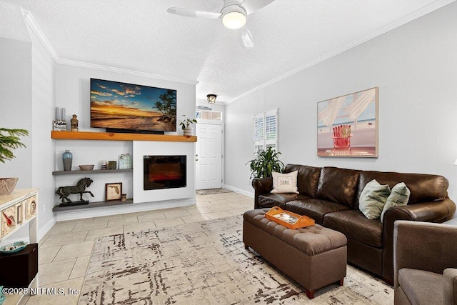 611 Selva Lakes Cir, Atlantic Beach, FL 32233 - living room with ornamental molding, a glass covered fireplace, a ceiling fan, and a textured ceiling