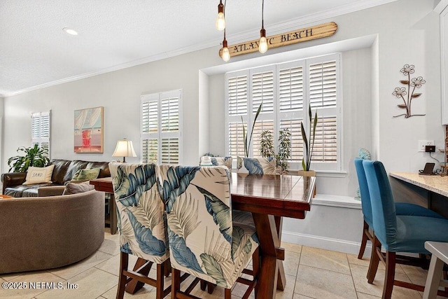 611 Selva Lakes Cir, Atlantic Beach, FL 32233 - dining room with ornamental molding and light tile patterned floors