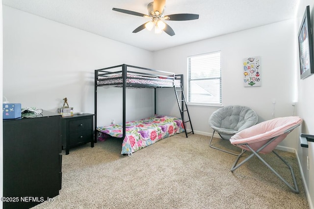 8820 Bandera Cir S, Jacksonville, FL 32244 - carpeted bedroom with baseboards and a ceiling fan