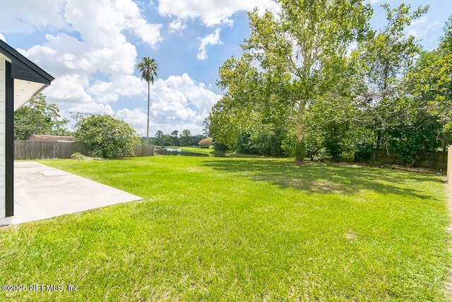 8820 Bandera Cir S, Jacksonville, FL 32244 - view of yard with a patio
